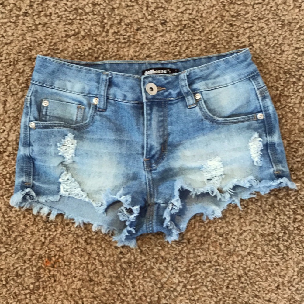 Size 1 Low rise shorts with frayed bottoms.